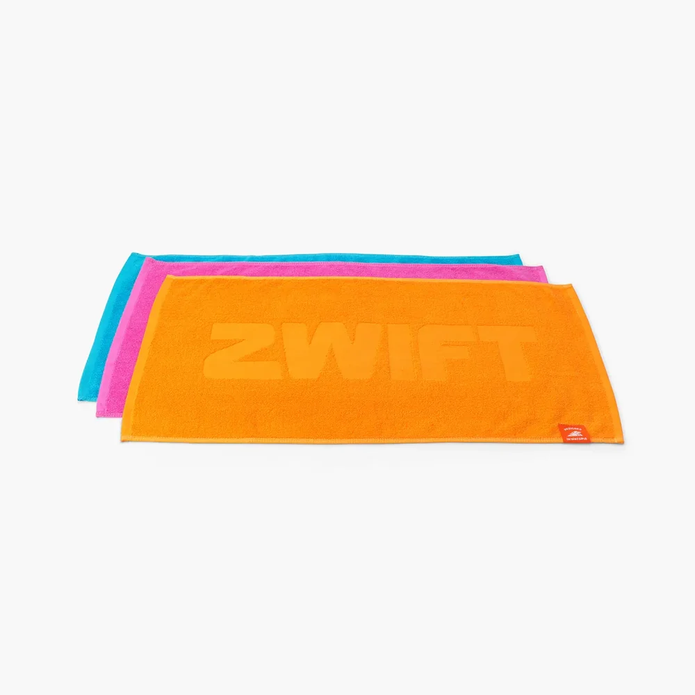 Zwift Core sweat towel set in orange, pink and teal with Zwift logo