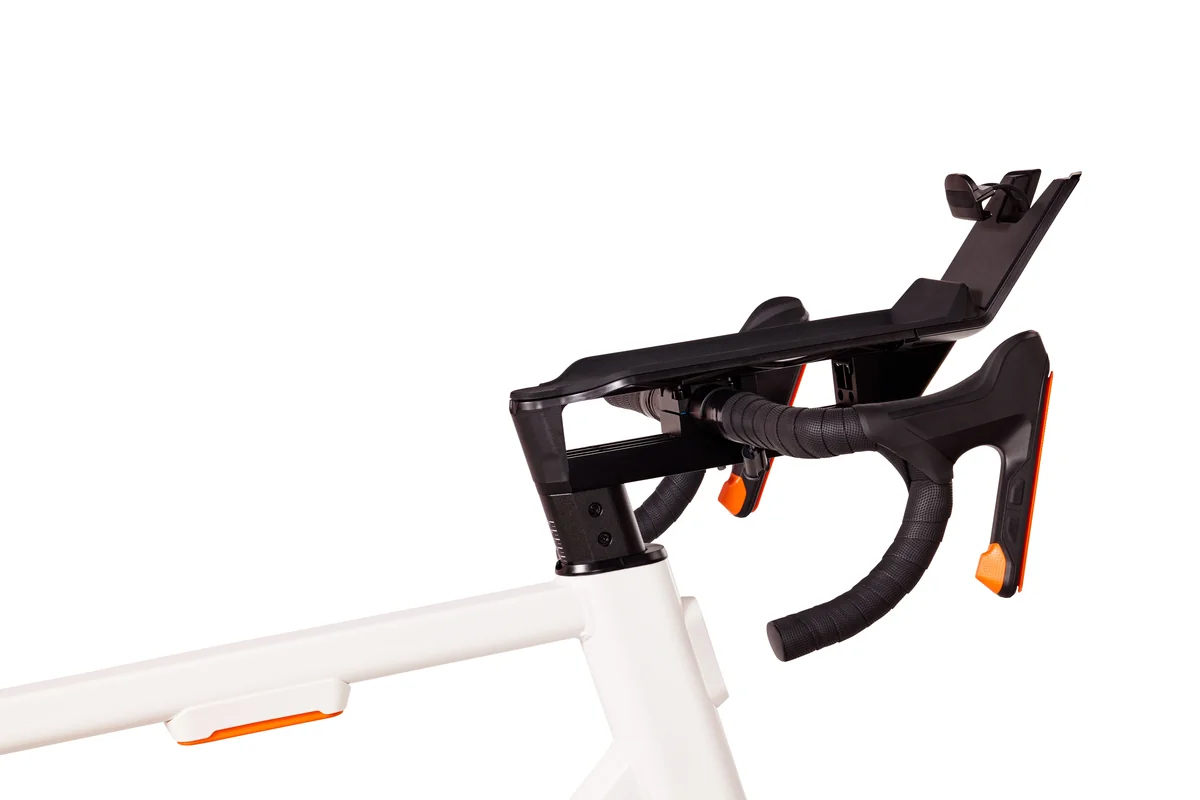 Zwift Ride handlebar and tablet holder detail showing the mounting system