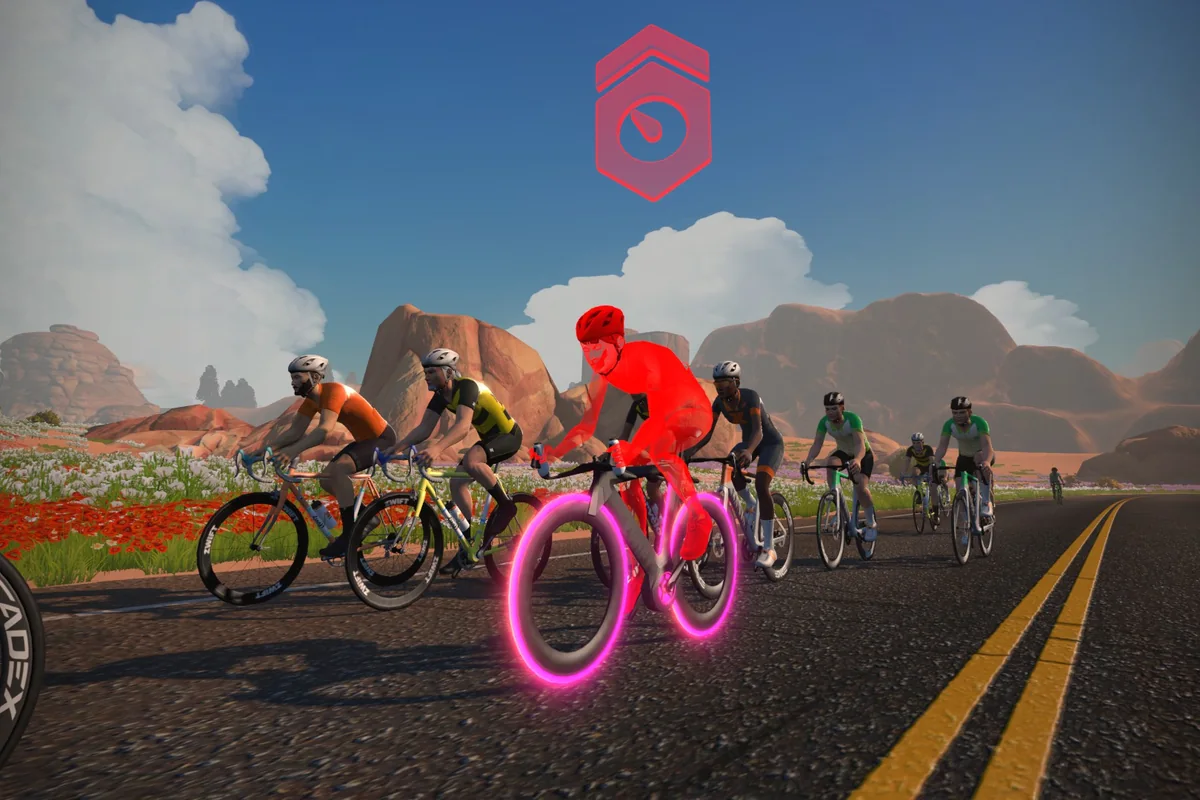 Zwift riders chasing a hard red RoboPacer through a desert canyon route