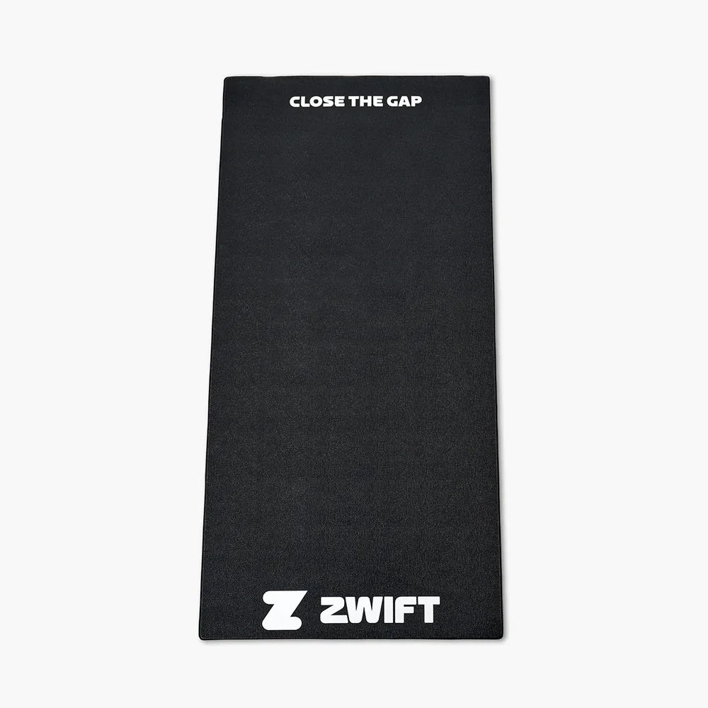 Zwift training mat in black with Close The Gap and Zwift branding